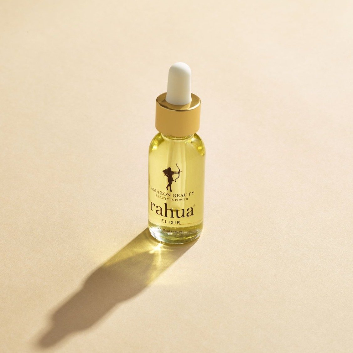 Rahua Hair and Scalp Elixir on the Floor with its Shaddow