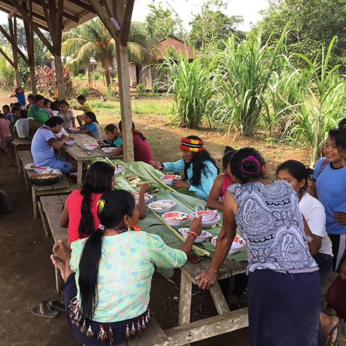 Rahua rainforest community having a meal altogether