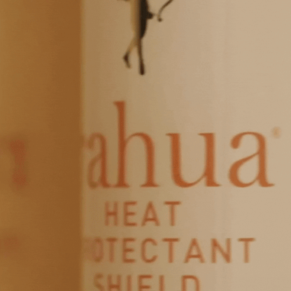 Rahua Heat Protectant Shield rolling on surface