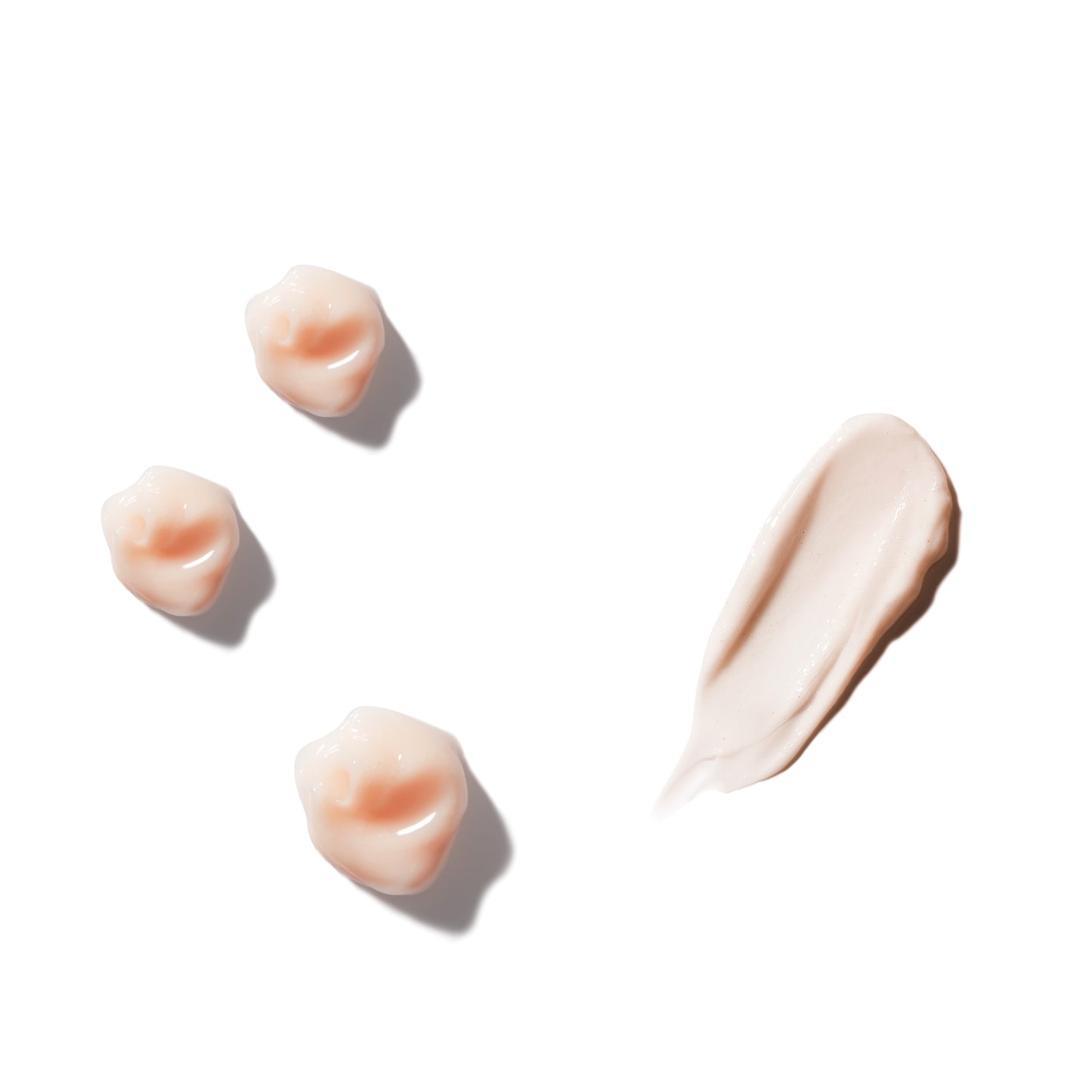 texture shot of three dollops of rahua hydration shampoo with a swipe of rahua hydration conditioner on a plain white background|variant:074-oz