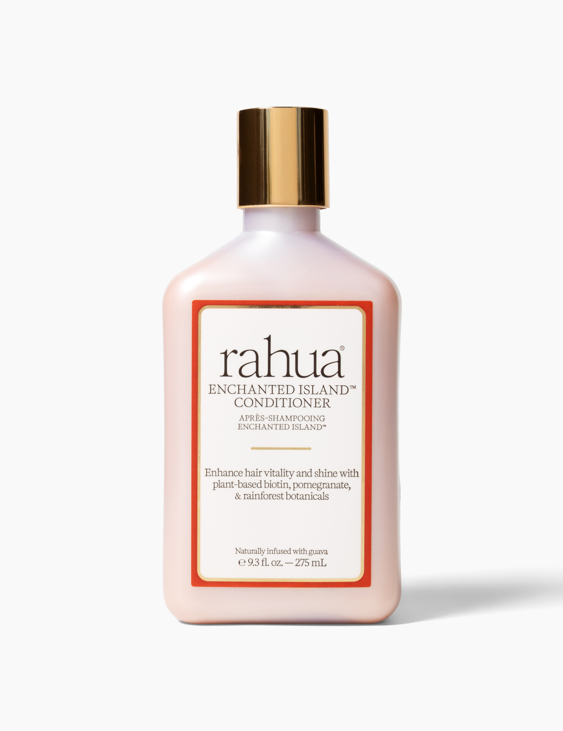 bottle with beige cap and orange label of rahua enchanted island conditioner on a plain white background|variant:93-oz