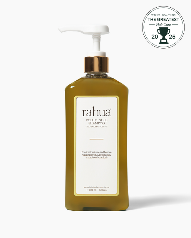 Rahua voluminous shampoo bottle with pump on a white background|variant:18-oz