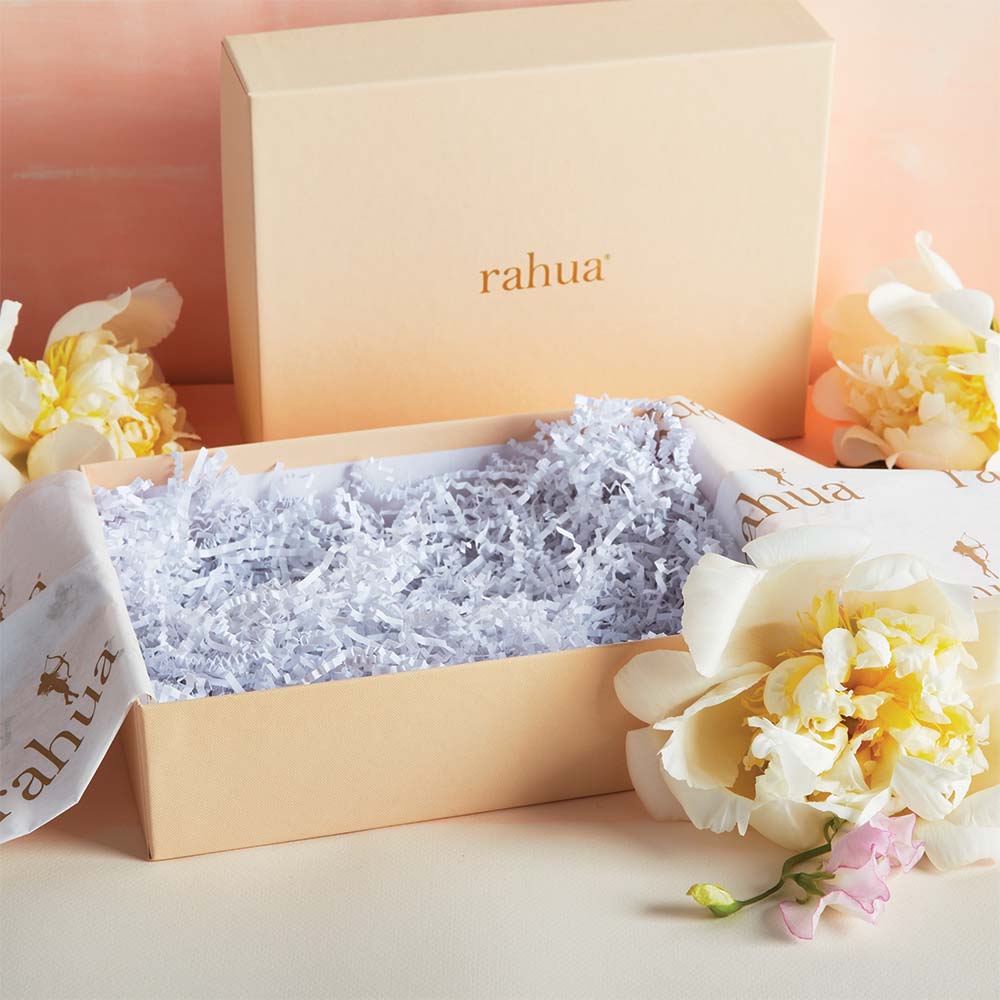 open half lead of rahua gift box with flowers
